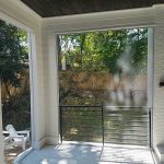 Enclosed porch area with new screens applied